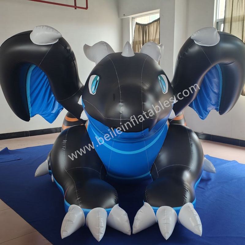 Inflatable blue and black dragon